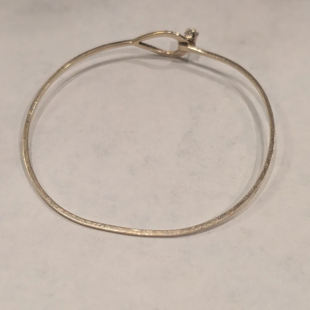 Avon Gold Tone Bypass Hinged Bracelet with Clear Stone - Picture 3 of 4